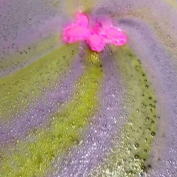 Island Blossom Bath Bomb creating a tropical oasis in a relaxing bath.
