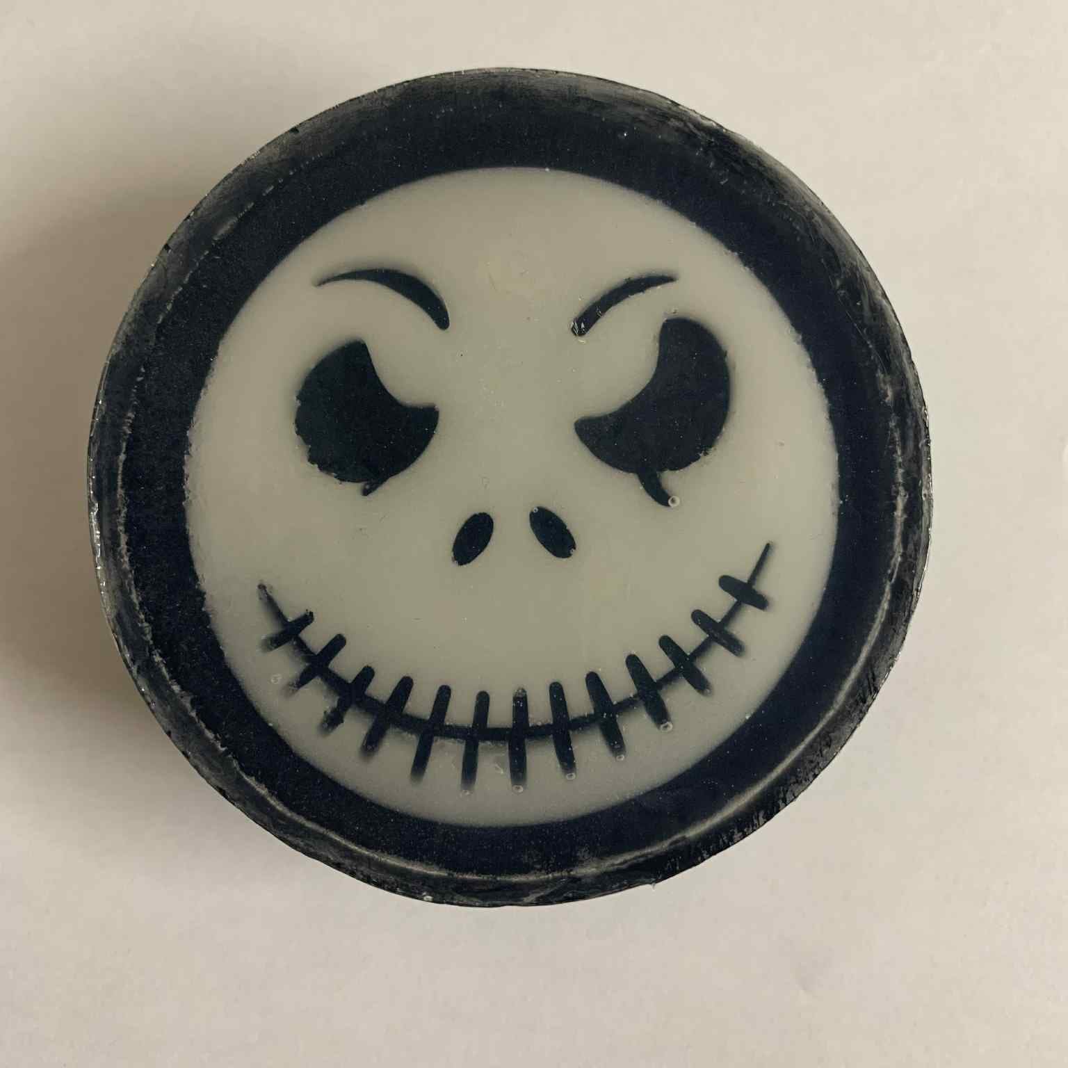 Jack Skellington Halloween soap with half black and clear layers, pumpkin spice scent, handmade for Halloween