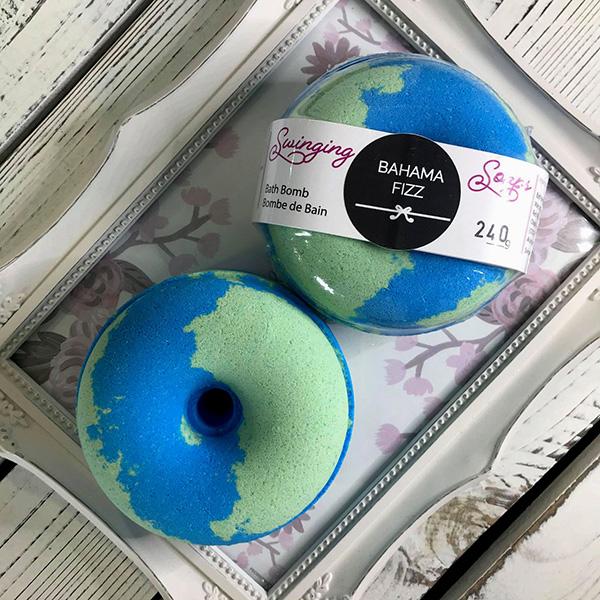 Bahama Fizz Donut Bath Bomb: Transform your bath with vibrant colors and tropical scents. A perfect bath bomb treat!