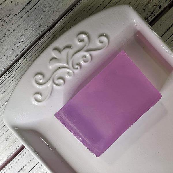 Translucent soft purple bar soap with enchanting Freesia scent.