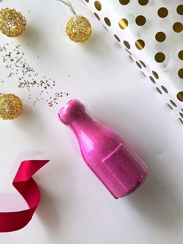 Champagne Bottle Bath Bomb - A burst of excitement and pink color for your bath.