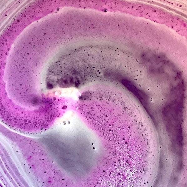 Mesmerizing Swirls of Purple - Black Raspberry Vanilla Bath Bomb in Action